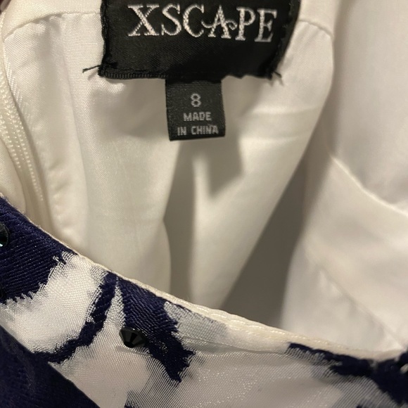 Xscape formal long prom dress size 8. Navy and white, bell shaped full skirt. - Picture 3 of 5